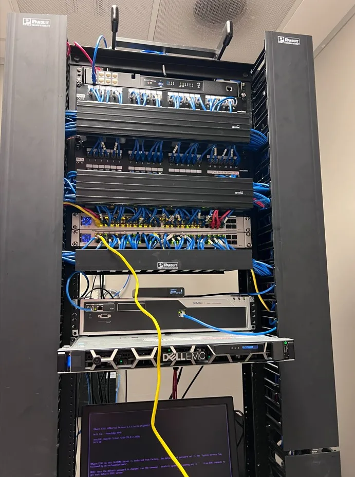 Network rack after professional cable cleanup