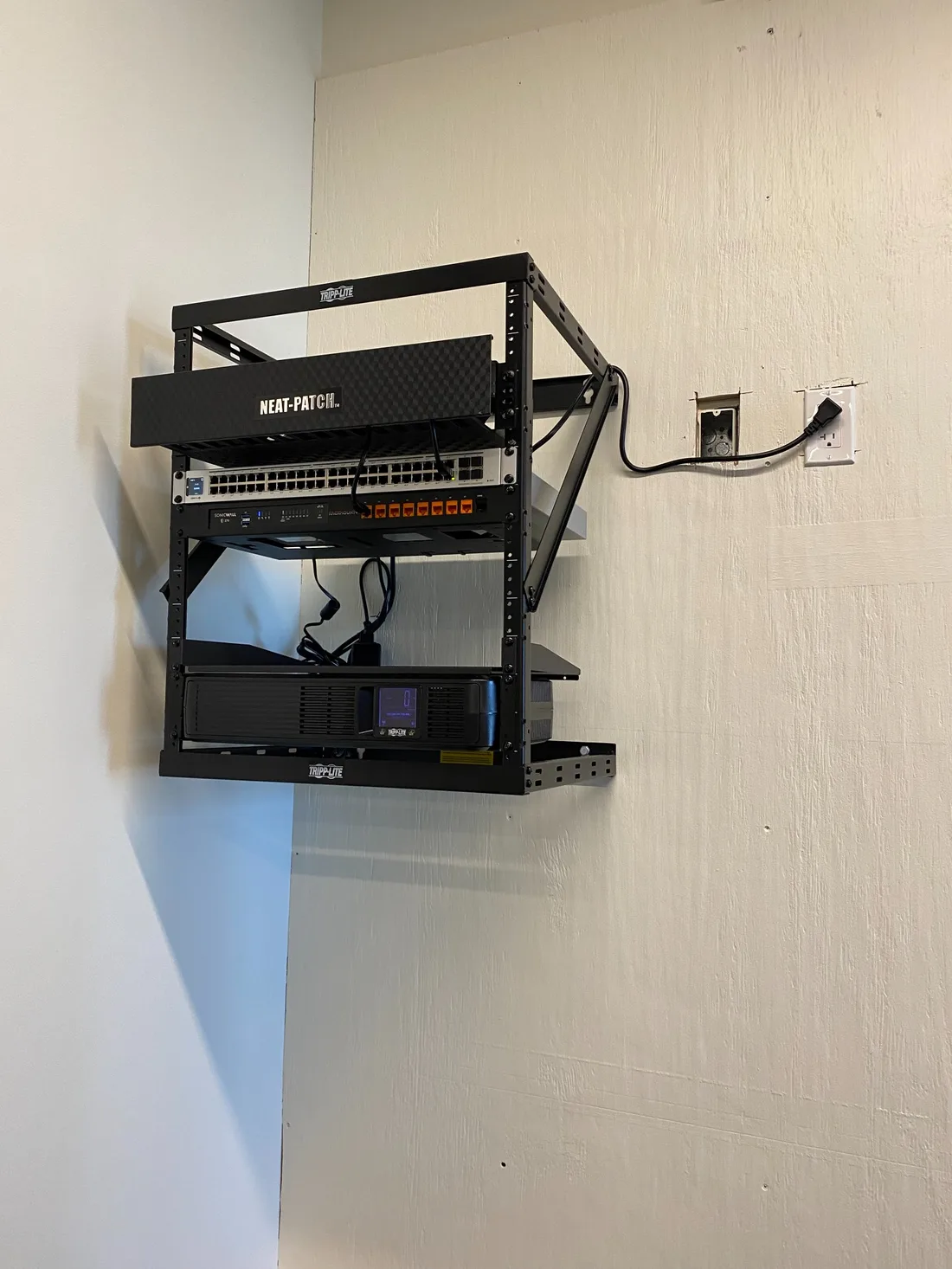 Wall rack installation with equipment